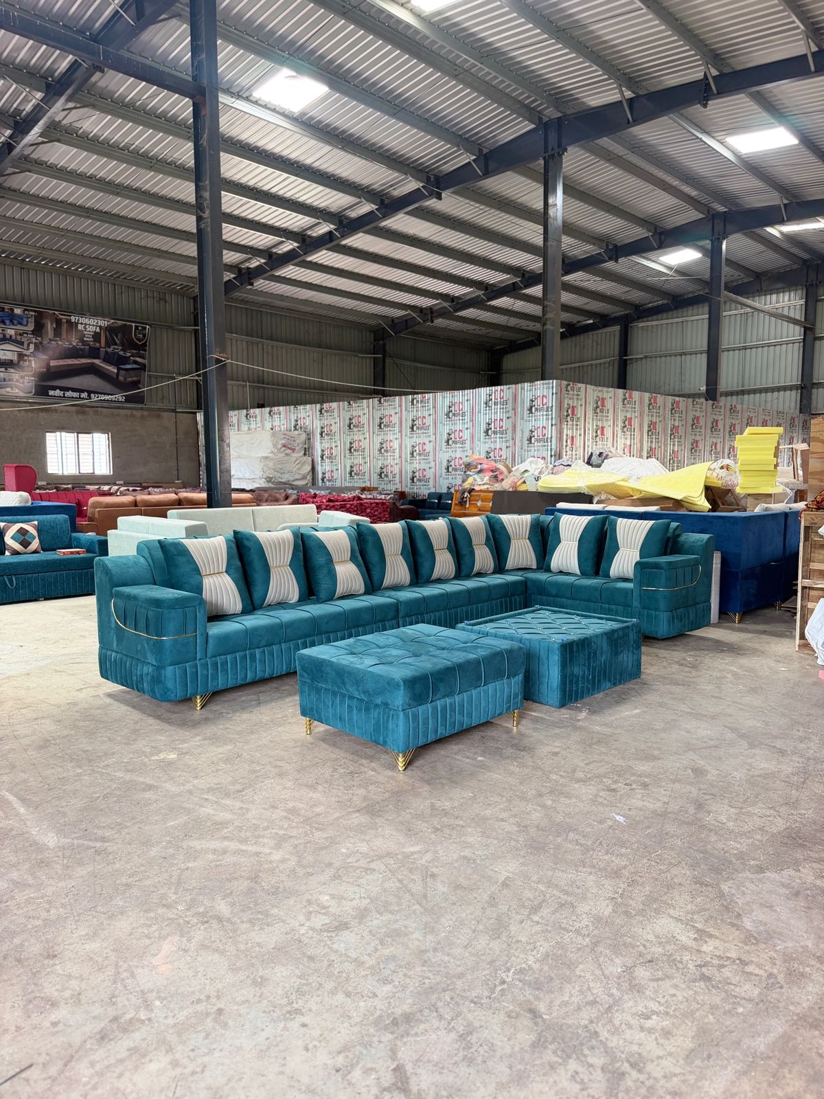 Teal Sectional with Ottomans